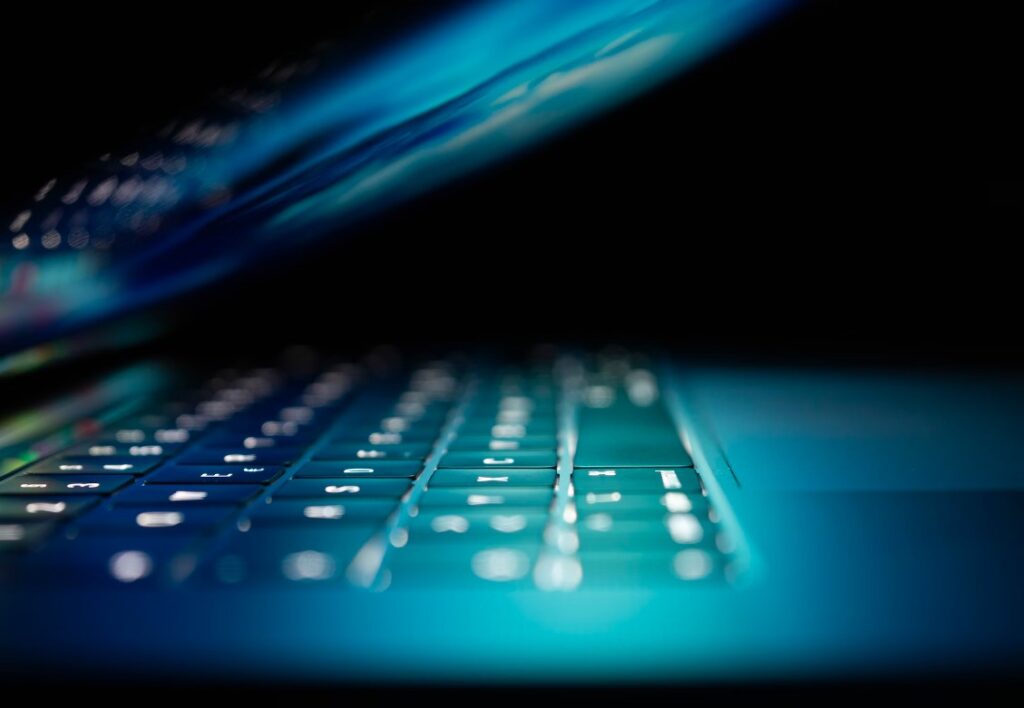 Laptop with code and network activity